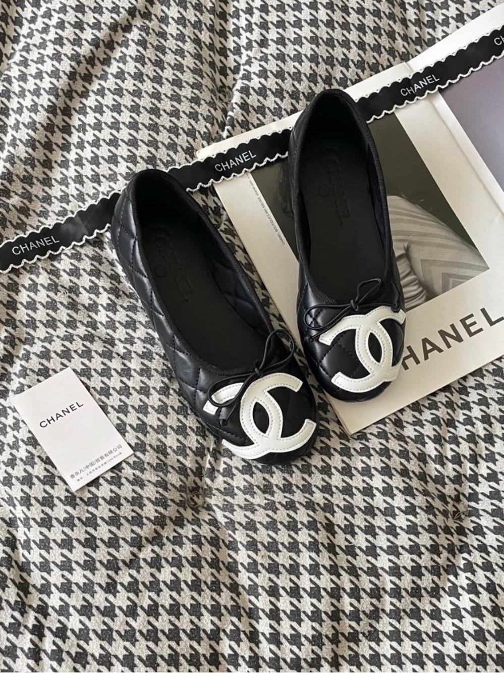 CHANEL Black Quilted Leather Flats with White CC Emblem